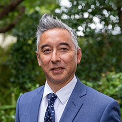 Headshot of Ken Maeshiro