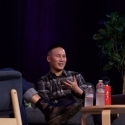 BD Wong sits on a chair 